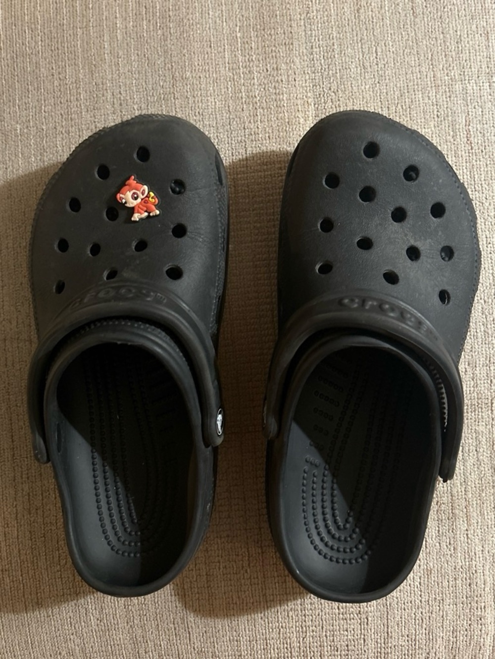 CROCS Classic Black Slip-On Clogs with Red Charm